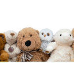 Assorted plush stuffed animals including a dog, bear, owl, and lamb