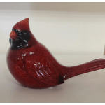 Red decorative bird figurine with a long tail