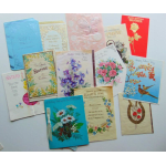 Assorted greeting cards with floral illustrations and birthday messages