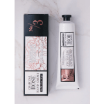 Hand cream tube and matching box with rose and botanical labeling