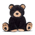 Black teddy bear plush with tan muzzle, ears, and paw pads
