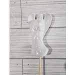 White ceramic angel ornament on a wooden stick