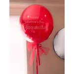 Red Valentine’s Day balloon with a ribbon bow and name text