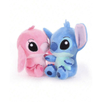 Two plush cartoon animal toys, one pink and one blue, sitting side by side