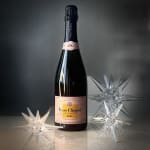 Bottle of Veuve Clicquot Rosé with clear star ornaments