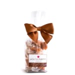 Bag of caramel candies tied with a brown bow