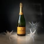 Bottle of Veuve Clicquot champagne with clear star-shaped ornaments