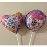 Two Mother's Day heart-shaped balloons with floral prints and sticks