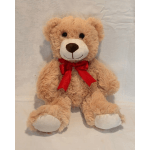 Plush teddy bear with a red ribbon bow