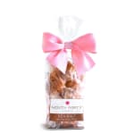 Bag of sea salt caramels tied with a pink bow