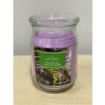 Lavender scented candle in a clear glass jar with a lid