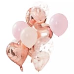 Cluster of pink and rose-gold balloons, including heart-shaped and confetti balloons