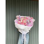 Pink and white bouquet with Hello Kitty toppers in a white wrap