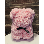 Pink rose-shaped teddy bear with a black ribbon bow