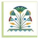 Decorative paper floral design on a white card with a green border