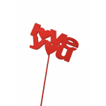 Red "love" pick on a stick against a white background