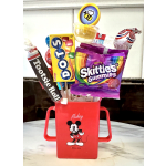 Mickey Mouse candy bouquet in a red container with assorted sweets on sticks