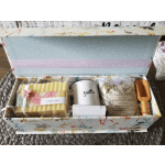 Gift box with soap, a mug, bath soak, and a wooden scoop