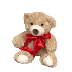 Plush teddy bear with a red ribbon bow