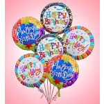Cluster of colorful Happy Birthday balloons on a pink background