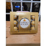 Box of Ferrero Rocher chocolates on a wooden table