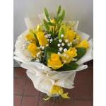 Hand-tied bouquet of yellow roses, lily buds, and white filler flowers wrapped in white paper.