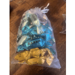Bag of wrapped chocolates in metallic blue, silver, and gold wrappers