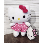 Hello Kitty plush toy in a pink polka-dot dress with a tag