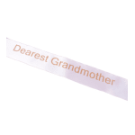 White ribbon printed with the words "Dearest Grandmother"