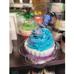 Blue and white frosted cupcake in a clear plastic container