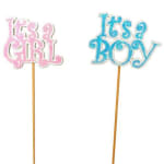 Pink "It's a Girl" and blue "It's a Boy" cake toppers on sticks