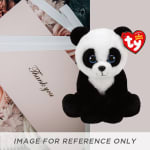 Plush panda bear beside a pale pink gift box with flowers