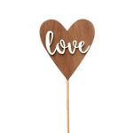 Wooden heart pick with the word love on a stick