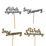 Glitter cake toppers reading With Sympathy and In Memory
