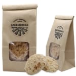 Two snickerdoodle candle bags with cookies in front