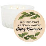 White candle with a retirement message on a wooden lid