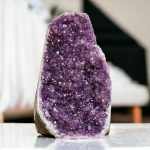 Purple crystal geode on a tabletop