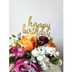 Bouquet of orange, pink, white, and purple flowers with a gold happy birthday topper