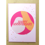 Happy anniversary greeting card with pink and peach abstract circle design and small star accents