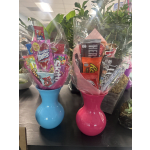 Two candy bouquets in bright blue and pink vases