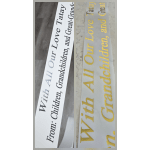 Two printed memorial ribbons with text honoring children and grandchildren.