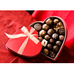Heart-shaped box of assorted chocolates with a ribbon bow