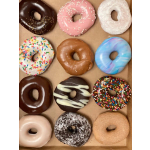 Assorted frosted donuts in a box