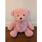 Pink teddy bear with a satin ribbon bow