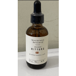 Bottle of Woodford Reserve orange bitters with a dropper cap
