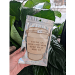 Packaged greeting card with a coffee cup design and bold text