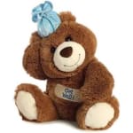 Brown teddy bear with a blue bow and a Get Well bandage
