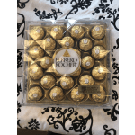 Box of Ferrero Rocher chocolates in gold wrappers