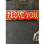 Red ribbon with gold "I LOVE YOU" text in clear packaging