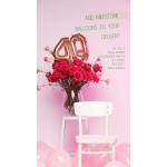 Pink rose arrangement with gold "40" balloons in a glass vase